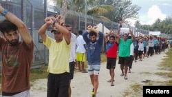 FILE - An undated image released Nov. 13, 2017, shows detainees staging a protest inside the compound at the Manus Island detention center in Papua New Guinea. (Refugee Action Coalition/Handout via Reuters)
