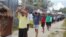 FILE - An undated image released Nov. 13, 2017, shows detainees staging a protest inside the compound at the Manus Island detention center in Papua New Guinea.  (Refugee Action Coalition/Handout via Reuters)