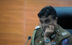 FILE - Sri Lanka police chief Pujith Jayasundara ia seen at police headquarters in Colombo, March 7, 2017.