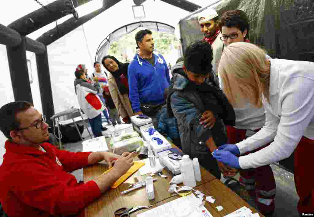 When the flood of Middle Eastern refugees arriving in Europe finally ebbs and asylum-seekers settle down in their new homes, Germany could unexpectedly find itself housing the continent&#39;s largest Muslim minority. Newly arrived migrants are given medical attention&nbsp; at an improvised temporary shelter in a sports hall in Hanau.