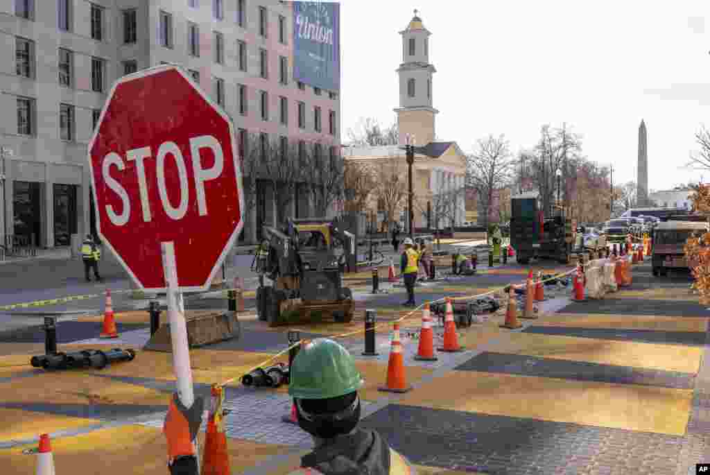 With the White House in the background, demolition begins on the Black Lives Matter mural in Washington.