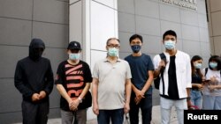 Keluarga dari 12 warga Hong Kong yang ditangkap China melapor kepada polisi di Hong Kong, Minggu (20/9).