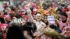 Revellers celebrate the start of the Carnival season in Cologne, western Germany, on November 11, 2021. 