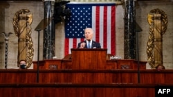 US President Joe Biden addresses a joint session of Congress at the US Capitol in Washington, DC, on April 28, 2021.