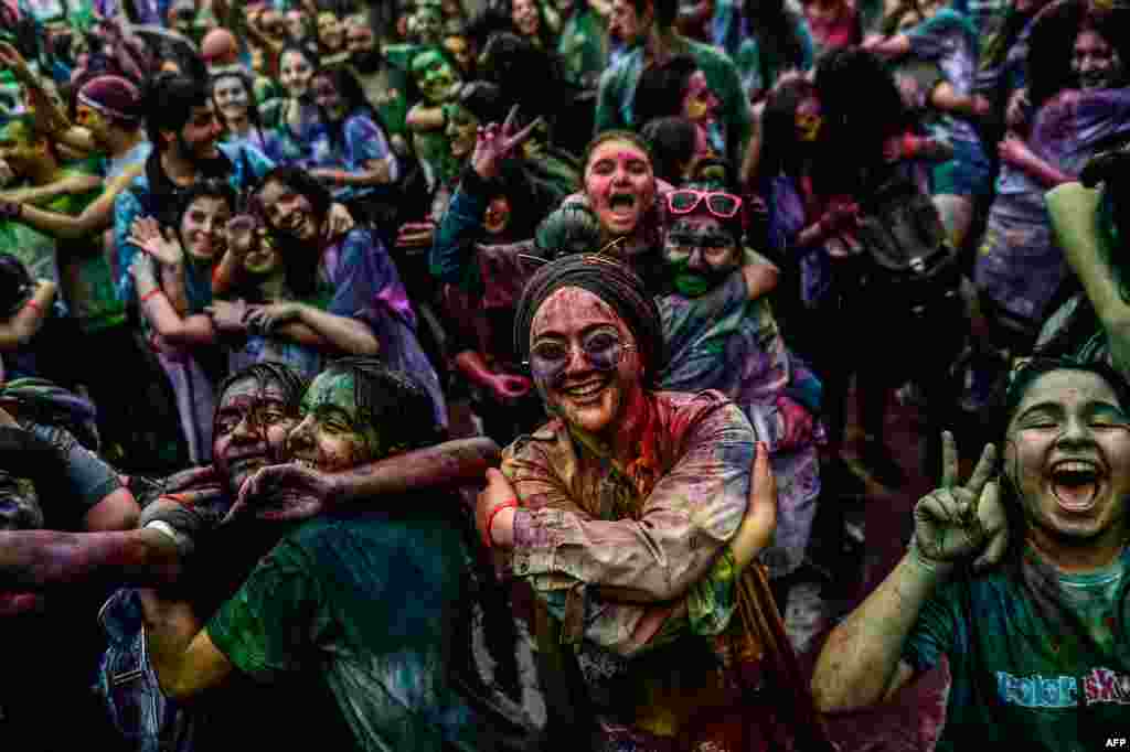 People take part in the Color Sky Festival at Kadikoy district in Istanbul, Turkey.