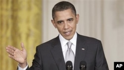 Le président Barack Obama lors de la conférence de presse à la Maison blanche avec son homologue mexicain Felipe Calderon Felipe Calderon