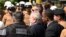 Former Brazilian president Luiz Inacio Lula da Silva, center front, arrives at the Federal Justice building in Curitiba, Brazil, Sept. 13, 2017.