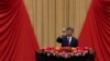 Chinese President Xi Jinping makes a toast on stage after delivering his speech at a dinner marking the 75th anniversary of the founding of the People's Republic of China, at the Great Hall of the People in Beijing, Sept. 30, 2024.