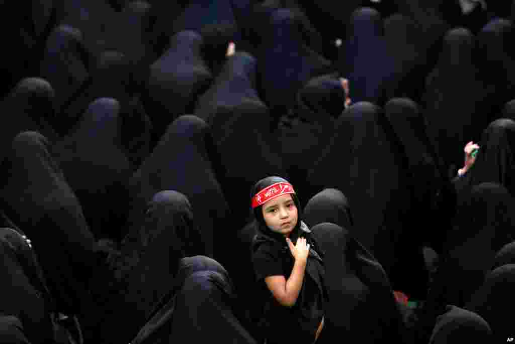 Muslim Shi&#39;ite women attend a mourning ceremony five days ahead of Ashoura, at the Sadat Akhavi Mosque in Tehran, Iran.