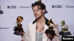 Harry Styles poses with his awards for Best Pop Vocal Album and Album of the Year for "Harry's House" during the 65th Annual Grammy Awards in Los Angeles, California, US, Feb. 5, 2023.