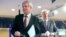 European Union chief Brexit negotiator Michel Barnier, right, and British Secretary of State for Exiting the European Union David Davis leave after a media conference at EU headquarters in Brussels, Belgium, Sept. 28, 2017. 