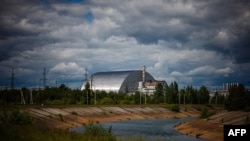 FILE - The New Safe Confinement at Chernobyl Nuclear Power Plant which cover the No. 4 reactor unit, seen May 29, 2022.