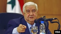 Menlu Suriah Walid al-Moallem menegaskan bahwa Presiden Bashar Al Assad akan tetap menjadi Presiden hingga 2014 (foto: dok). 