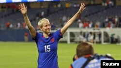 United States forward Megan Rapinoe acknowledges fans after game against South Africa in her last national team appearance at Soldier Field Sept. 24, 2023. Jon Durr/USA TODAY Sports