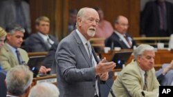 North Dakota House Majority Leader Al Carlson speaks to members in the House in Bismarck, N.D., on Thursday, Aug. 4, 2016 during a floor debate on SB 2379. "This is a good bill, it's not a time to play politics." (Tom Stromme/The Bismarck Tribune via AP) 