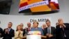 Merkel Wins Historic Fourth Term But Far-right Populists Surge 