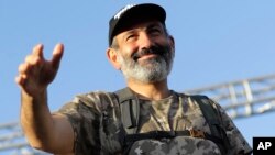 Opposition lawmaker Nikol Pashinian gestures as he addresses his supporters in Republic Square in Yerevan, Armenia on May 2, 2018.