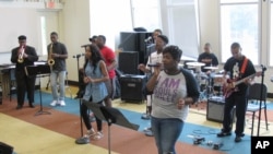 A group of Stax Music Academy musicians rehearse for their upcoming tour of Europe, in Memphis, Tennessee, June 30, 2017.