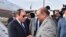 In this photo released by the Egyptian Presidency, Egyptian President Abdel-Fattah el-Sissi, left, is greeted by Sudanese President Omar al-Bashir on his arrival to Khartoum, Sudan, Thursday, July 19, 2018.