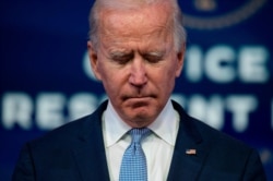 US President-elect Joe Biden speaks at the Queen Theater on January 6, 2021, in Wilmington, Delaware.