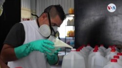 El Salvador: presos fabrican alcohol gel.