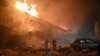 Rescuers of the State Emergency Service work to extinguish a fire in a building after a drone strike in Kharkiv, on Jan. 28, 2025, amid the Russian invasion in Ukraine.