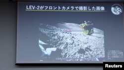 A screen projecting an image taken by LEV-2 on the moon, during a press conference on SLIM’s moon landing mission, in Tokyo, Japan, Jan. 25, 2024. 