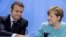 El presidente de Francia, Emmanuel Macron (izquierda) y la canciller de Alemania, Angela Merkel, asistieron a una conferencia de prensa después de una reunión previa a la cumbre del G-20 en Berlín, Alemania, el jueves, 29 de junio de 2017.