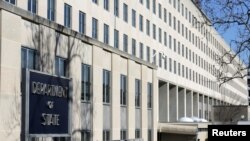 FILE - The State Department Building is pictured in Washington, Jan. 26, 2017. The State Department says it has "publicly designated" Goran Radosavljevic and his immediate family and banned them from entering the United States.
