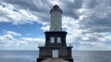 The Keweenaw Waterway Lower Entrance Light stands in Keweenaw Bay, June 2, 2022, in Chassell, Michigan. (Luke Barrett/General Services Administration via AP)