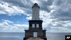 The Keweenaw Waterway Lower Entrance Light stands in Keweenaw Bay, June 2, 2022, in Chassell, Michigan. (Luke Barrett/General Services Administration via AP)