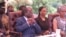 FILE: President Robert Mugabe and his wife, Grace Mugabe, at a Politburo meeting.