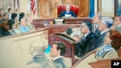 FILE - This courtroom sketch shows Paul Manafort listening to U.S. District Judge T.S. Ellis III at federal court in Alexandria, Va., Aug. 21, 2018.