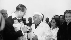 FILE - In this Jan. 21, 1959 file photo, India's Prime Minister Jawaharlal Nehru welcomes Britain's Prince Philip to New Delhi, India.