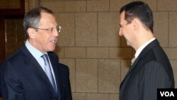 Minis afè etranjè ris la Sergei Lavrov ak Prezidan Siryen an Bashar Al- Assad (foto achiv 2008)