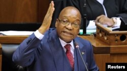 FILE - President Jacob Zuma gestures as he addresses the parliament in Cape Town, South Africa, Nov. 2, 2017. 