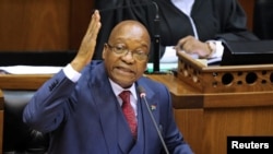 FILE - President Jacob Zuma gestures as he addresses the parliament in Cape Town, South Africa, Nov. 2, 2017. 