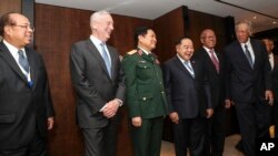 U.S. Defense Secretary Jim Mattis (2nd-L) laughs with Southeast Asian defense ministers after their meeting at the 17th International Institute for Strategic Studies (IISS) Shangri-la Dialogue. (AP Photo/Yong Teck Lim)