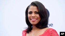 FILE - Omarosa Manigault poses at The Hollywood Reporter's 25th Annual Women in Entertainment Breakfast, Dec. 7, 2016, in Los Angeles. 