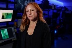 Erin Burke, Section Chief of the Child Exploitation Investigations Unit at Homeland Security, poses inside the Victim Identification Lab, part of Homeland Security's Child Exploitation Investigations Unit, in Fairfax, Va., Nov. 22, 2019.