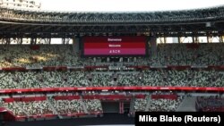 Pemandangan umum di dalam stadion sebelum upacara pembukaan Olimpiade Jepang. (Foto: REUTERS/Mike Blake)