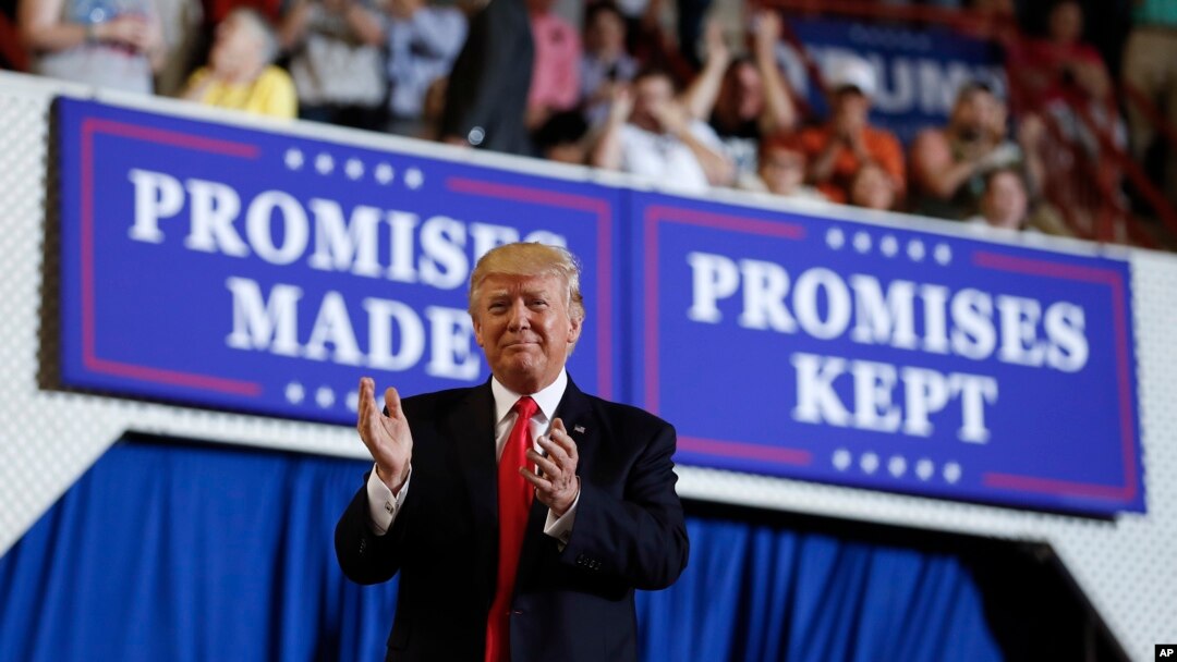 President Donald Trump arrives to speak at the Pennsylvania Farm Show Complex and Expo Center in Harrisburg, Pennsylvania, April 29, 2017, on the 100th day of his presidency.