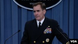 FILE- Pentagon spokesman Rear Admiral John Kirby speaks at a news briefing about the situation in Iraq, at the Pentagon, June 13, 2014.