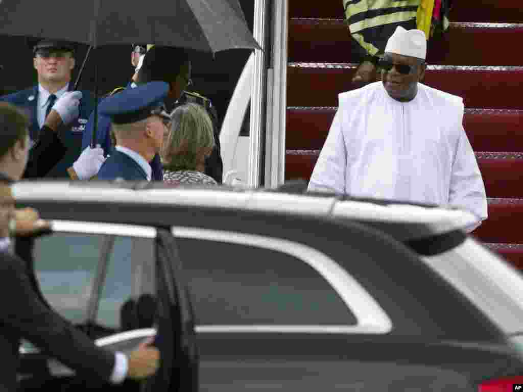 Mali President Ibrahim Boubacar Keita (right) arrives to attend the U.S. - Africa Leaders Summit, at Andrews Air Force Base, Maryland, Aug. 3, 2014.