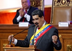FILE - Venezuela's President Nicolas Maduro delivers his annual state of the nation speech during a special session of the National Constituent Assembly, in Caracas, Venezuela, Jan. 14, 2020.