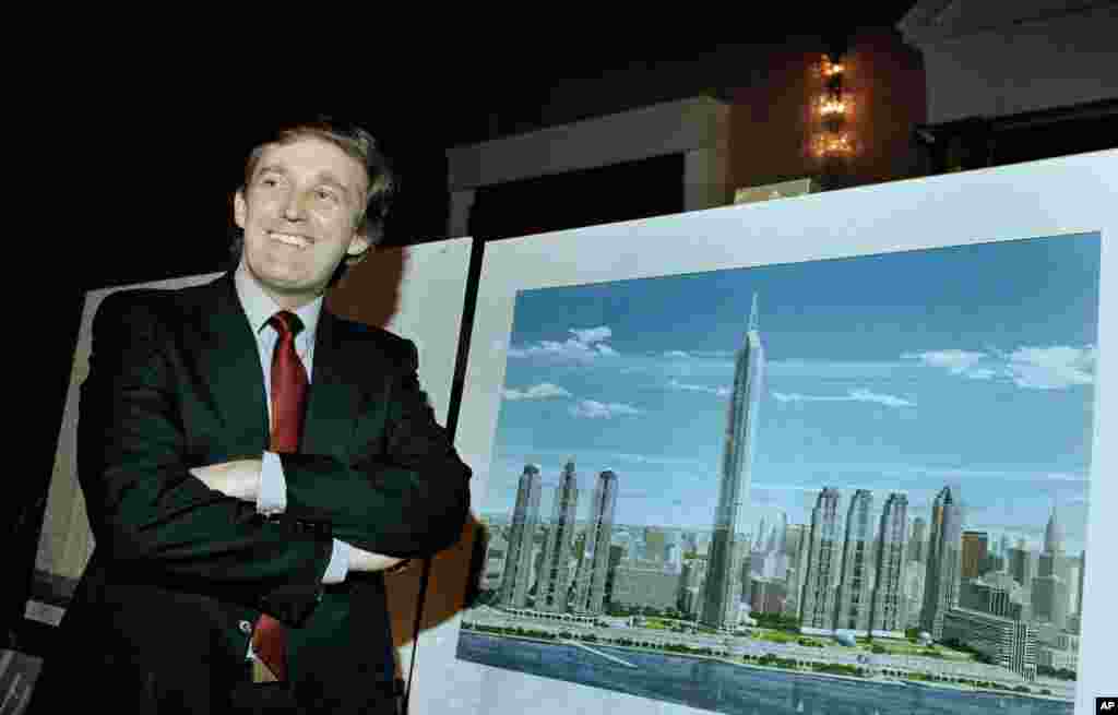 Real estate mogul Donald J. Trump displays an artist's concept of "Television City," which would be on the far west side of Manhattan, Nov. 18, 1985. (AP Photo/Marty Lederhandler)