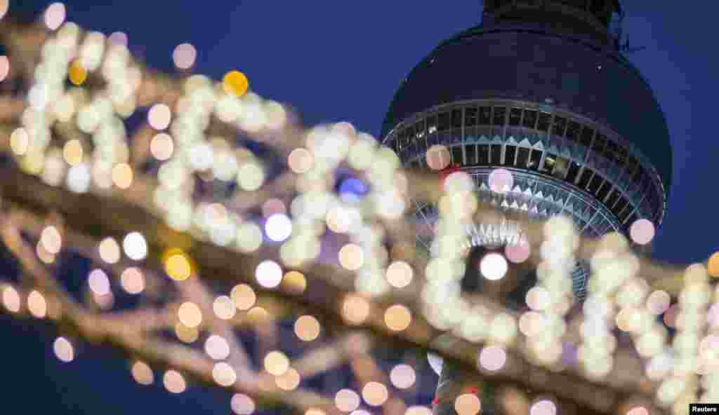 Christmas market decorations are pictured in front of the television tower in Berlin, Germany.