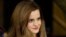 FILE - Actress Emma Watson walks at Brown University in Providence, R.I. After slipping from the top of the most popular baby names six years ago, Emma was back at No. 1 in 2014. 