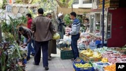 Markets are open and fully stocked as fresh produce comes in from the countryside and abroad. Cairo, February 7, 2011