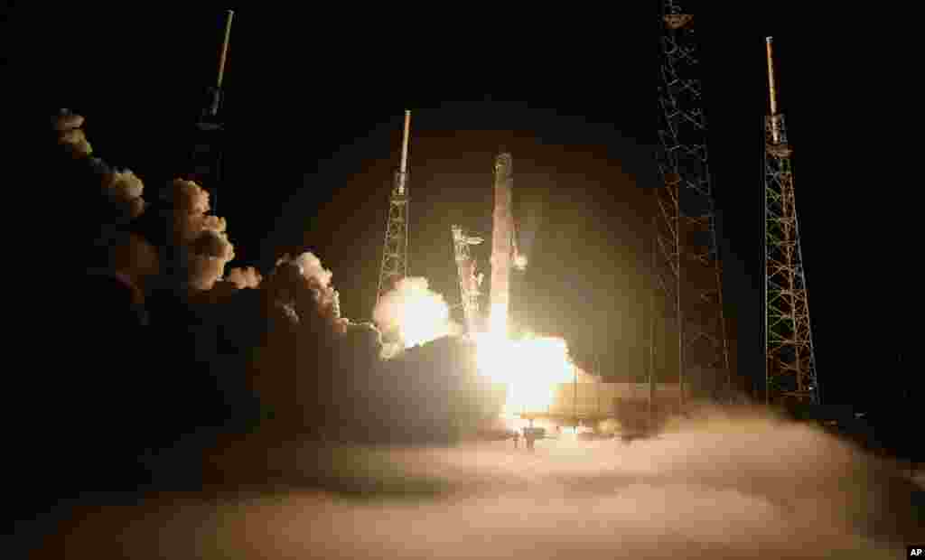 The SpaceX Falcon 9 test rocket lifts off from Space Launch Complex 40 as ground fog covers the pad at the Cape Canaveral Air Force Station. (Reuters)